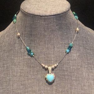 Necklace with reversible heart pendant! Sterling silver and turquoise stone.